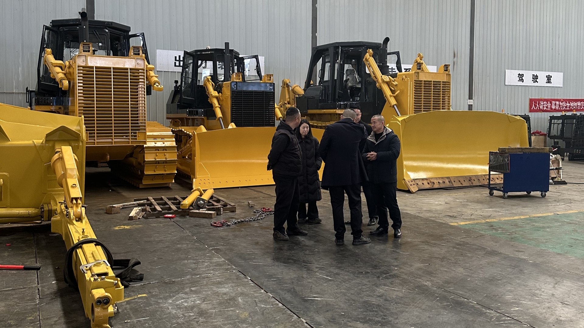 Customers from Papua New Guinea arrive at the factory.